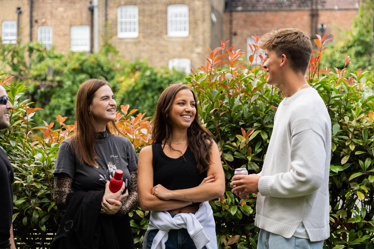 3 people smiling 
